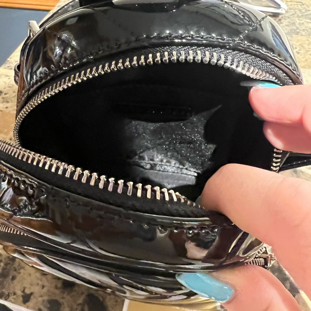 Brand new, never used Michael Kors mini back pack. Tags still attached .